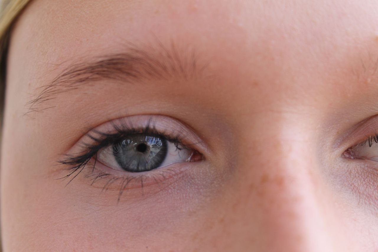 Detailed close-up of a blue eye capturing the intricacies of the iris.